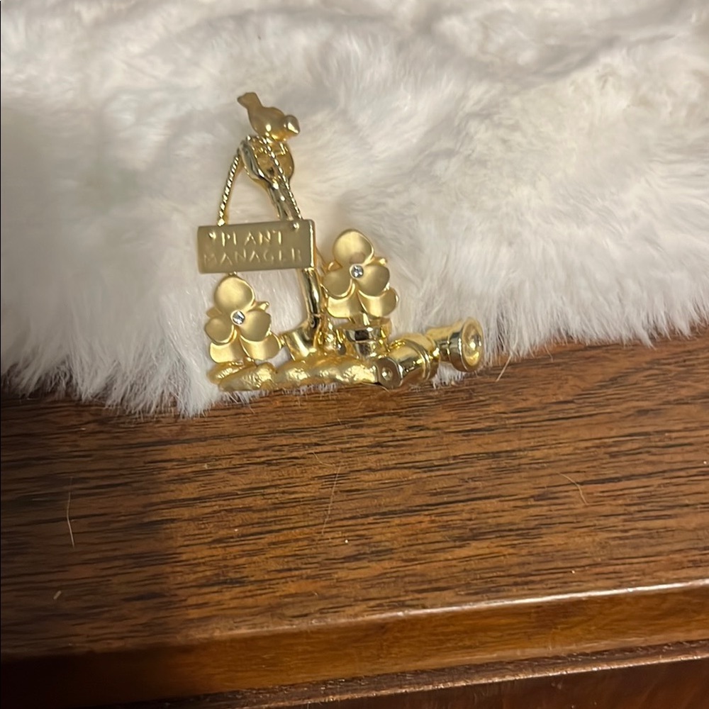 CHANEL Gold Brooch with Floral Design